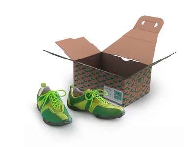 Tragetasche aus Wellpappe mit Schuhen davor Tragetasche aus Wellpappe mit Schuhen davor