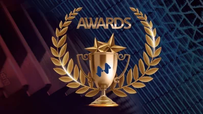 a golden trophy with stars and a laurel wreath