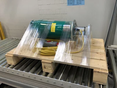 Bauteil verpackt mit Wickelsystem AMS Bauteil verpackt mit Wickelsystem AMS